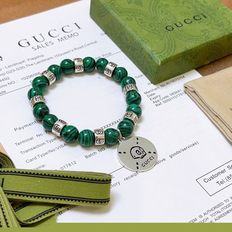 G*u*i bracelets